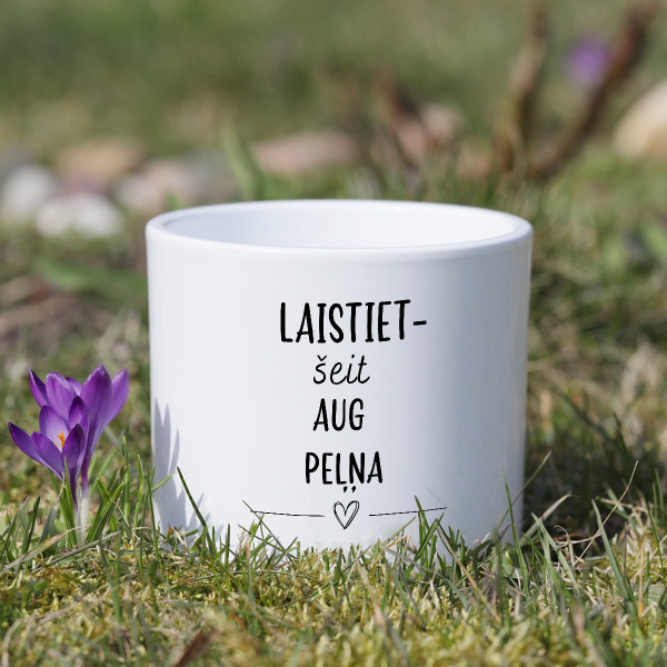Keramikas pods "Laistiet – šeit aug peļņa"